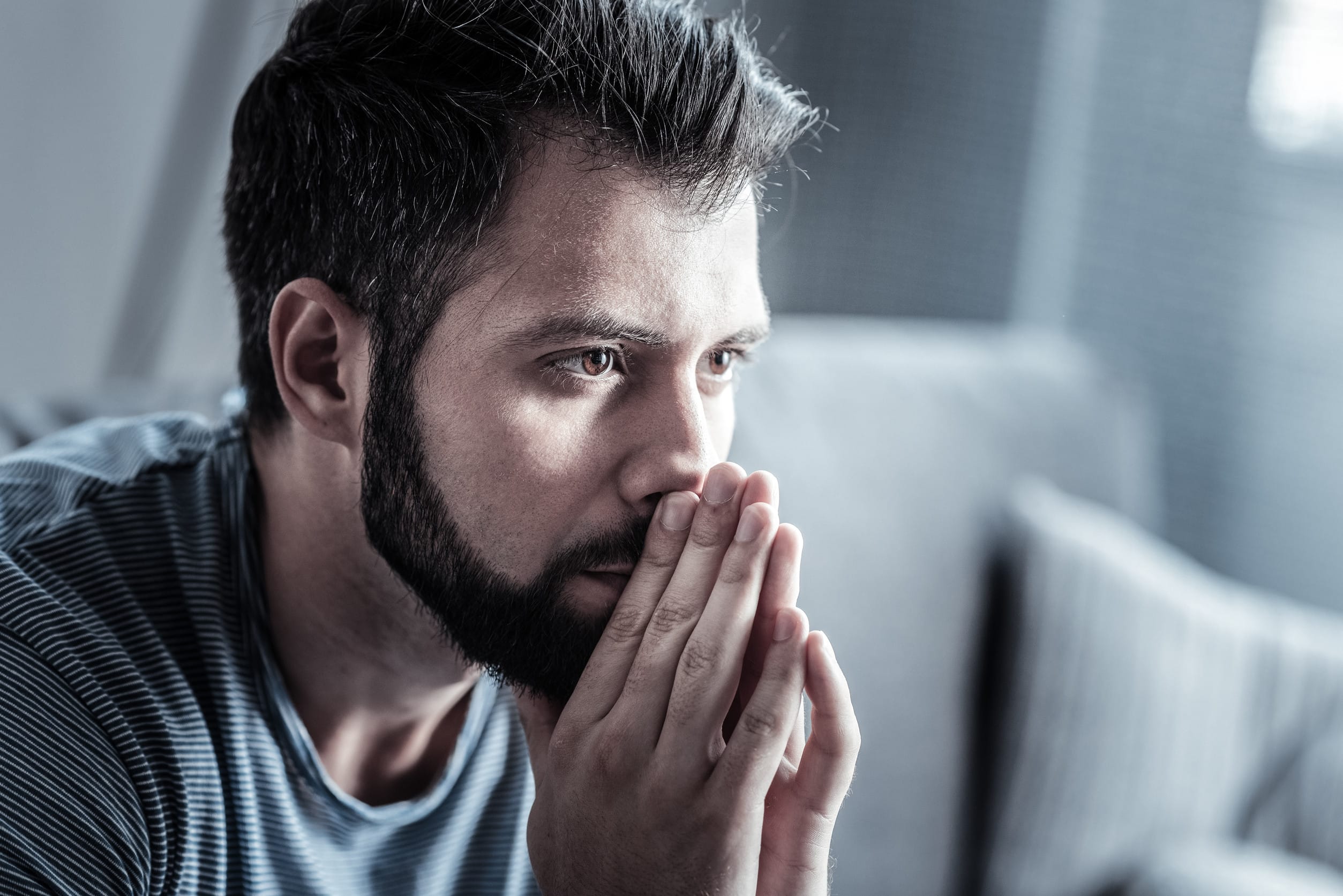 Portrait of concentrated male that being at home
