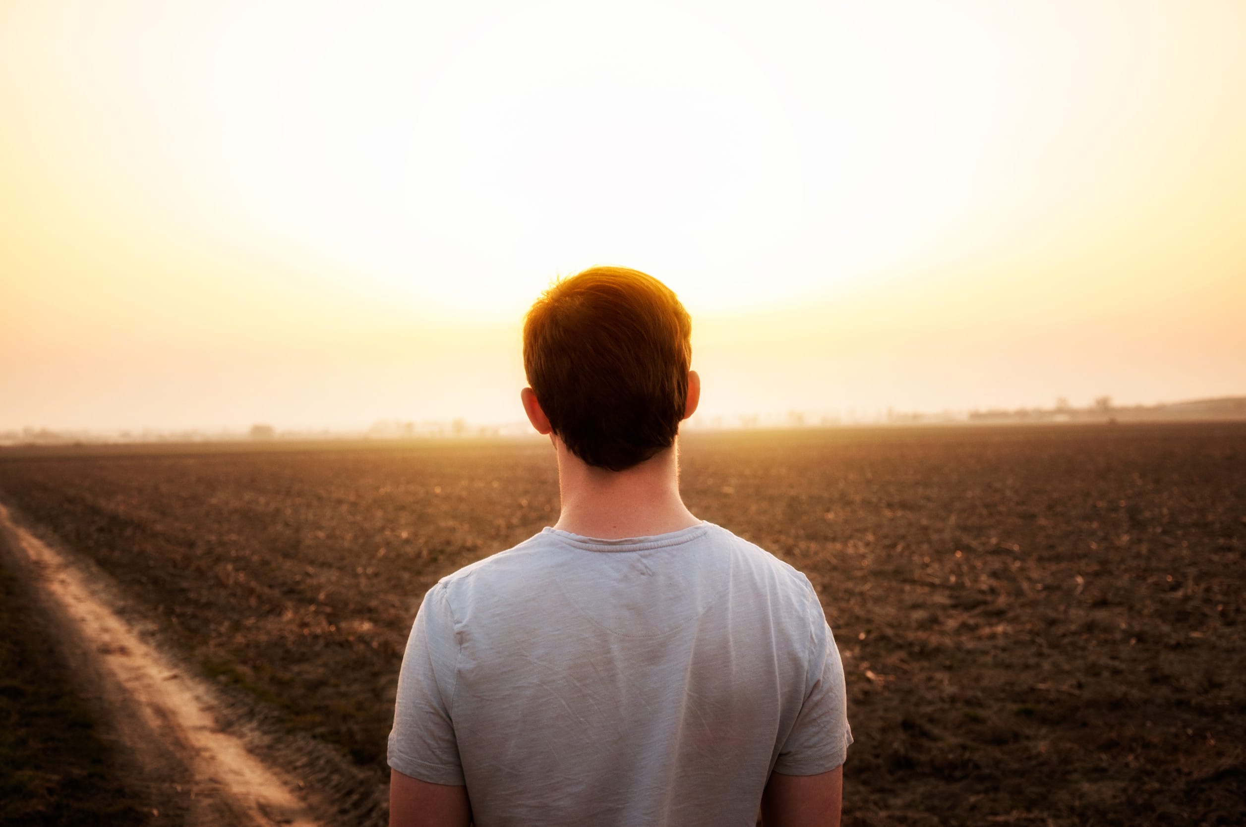 Someone sitting in silence and attempting to make a decision