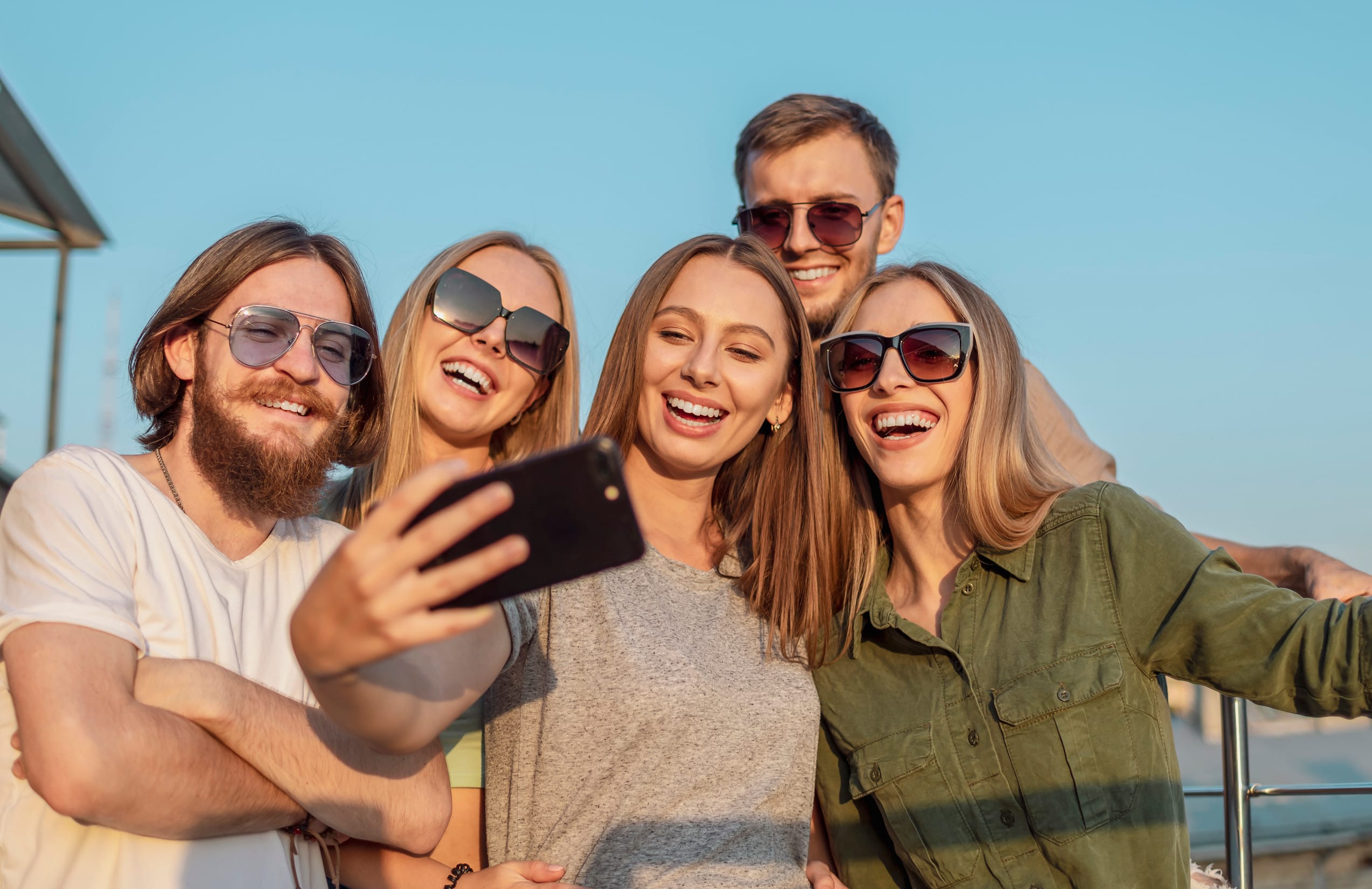 A happy group of friends, with no sign that any are weird.