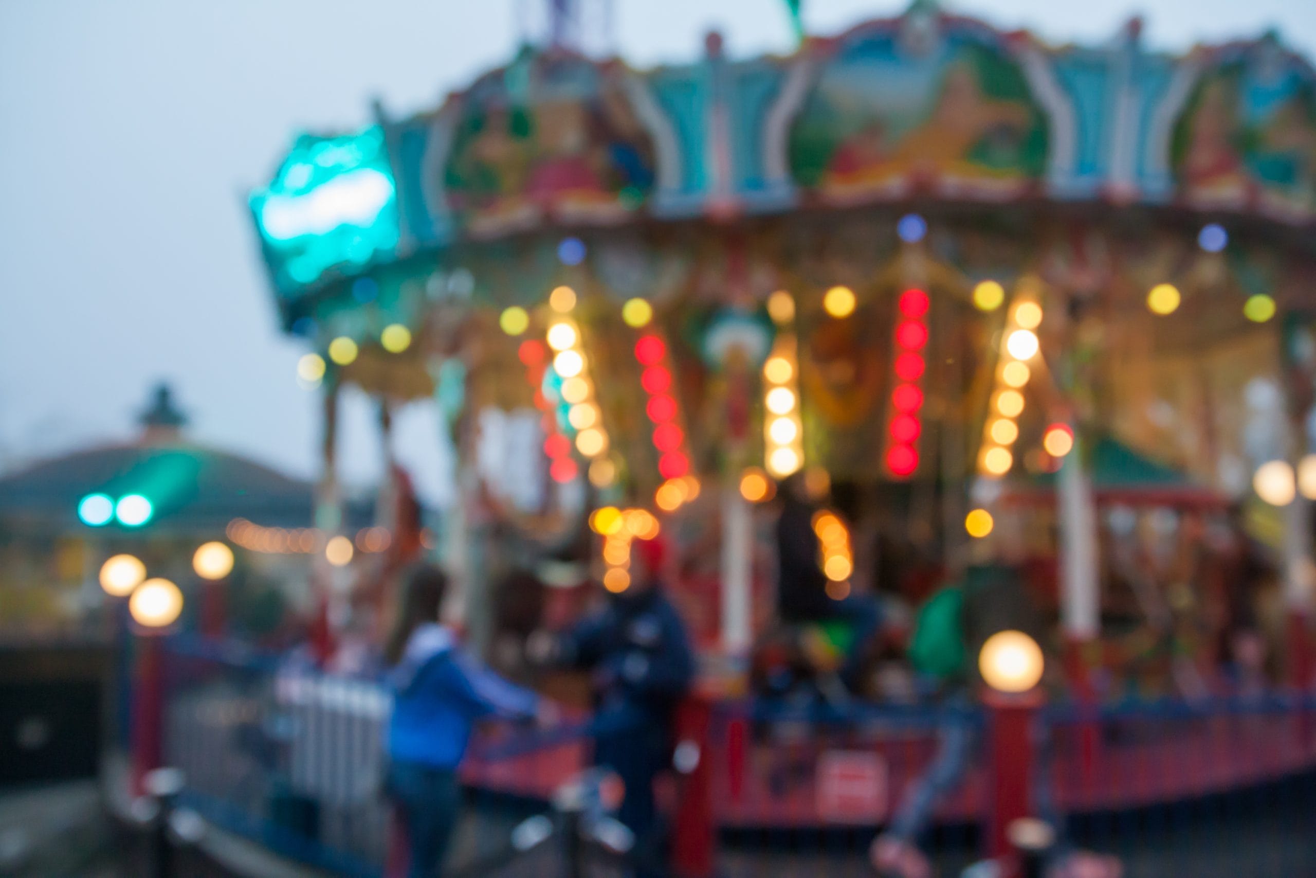 A blurry image from a Disney park. Disney is a brand with a logo that has hidden meanings.