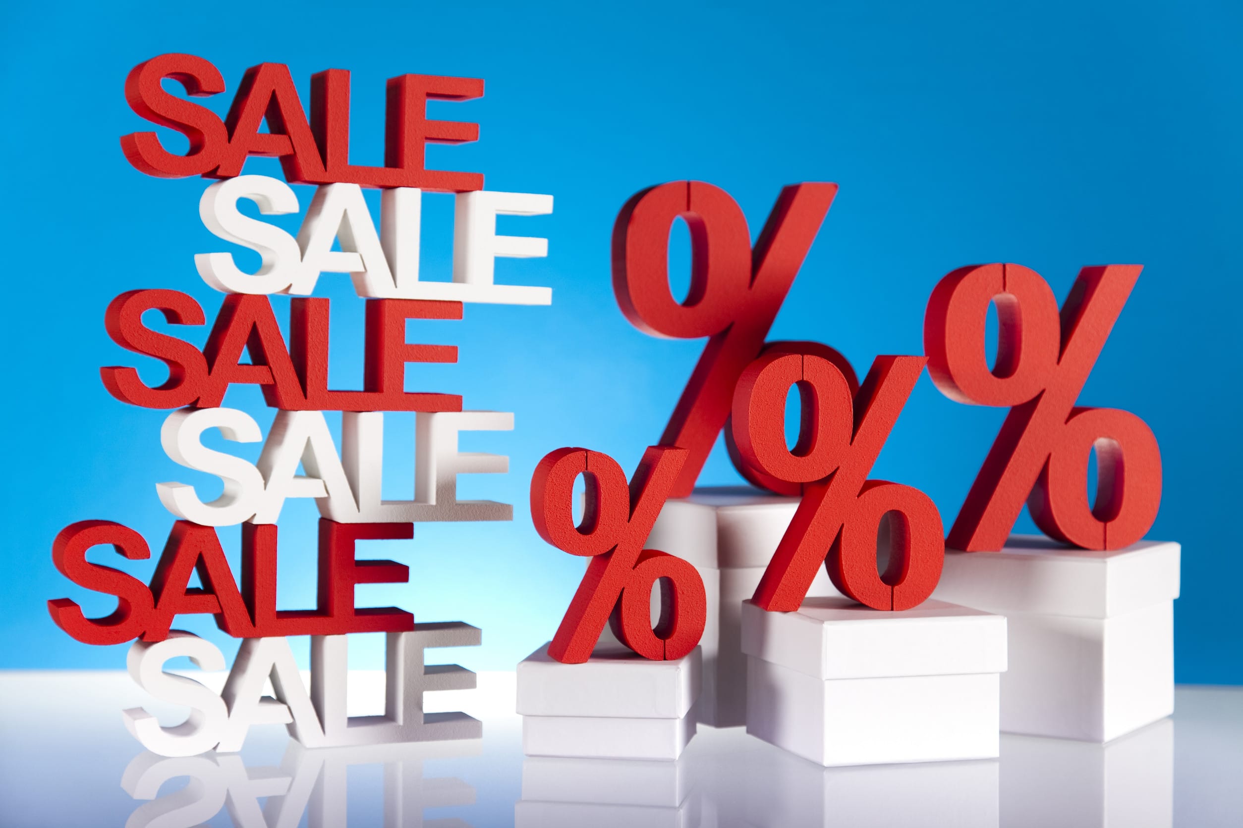 A graphic showing a sale and discounts, which can signify to smart spending