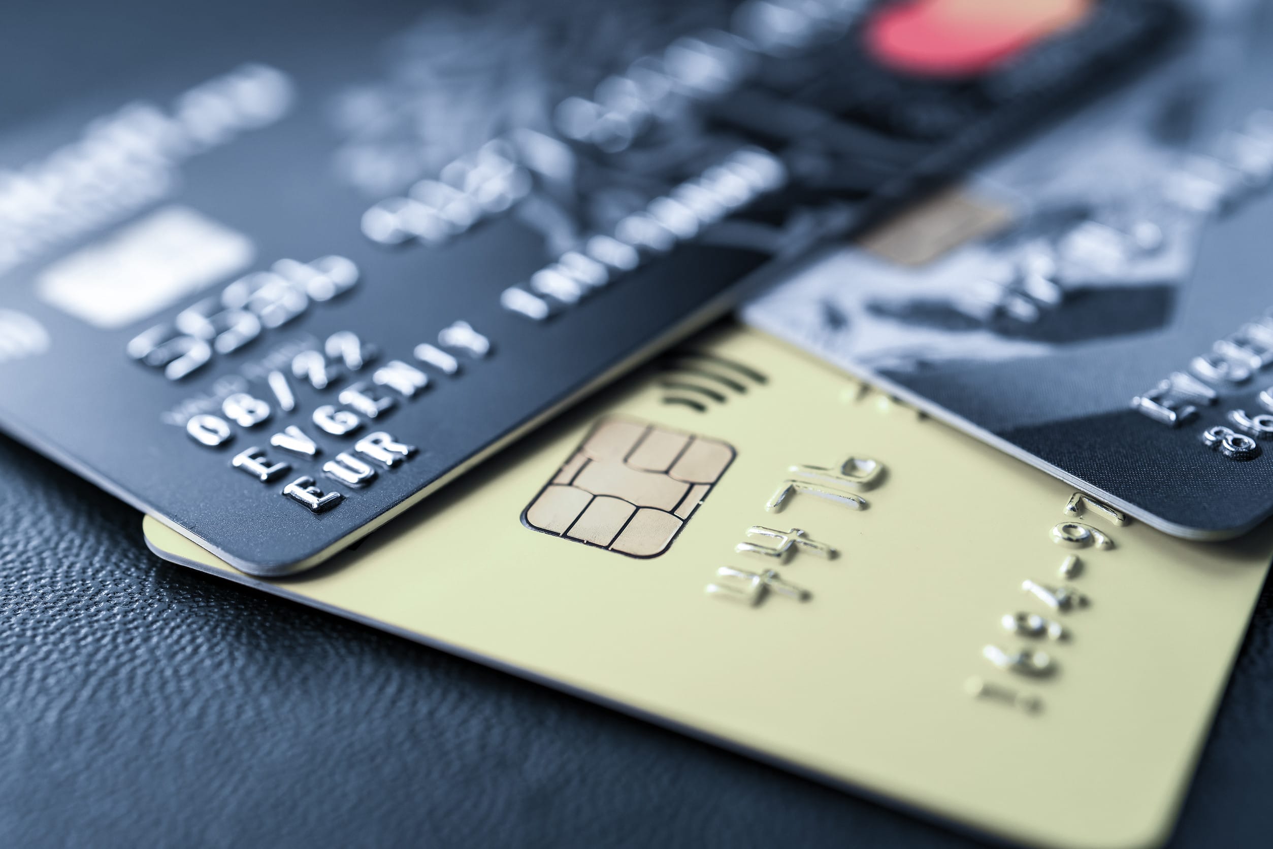 A group of credit cards, which are part of dangerous money myths still taught in schools