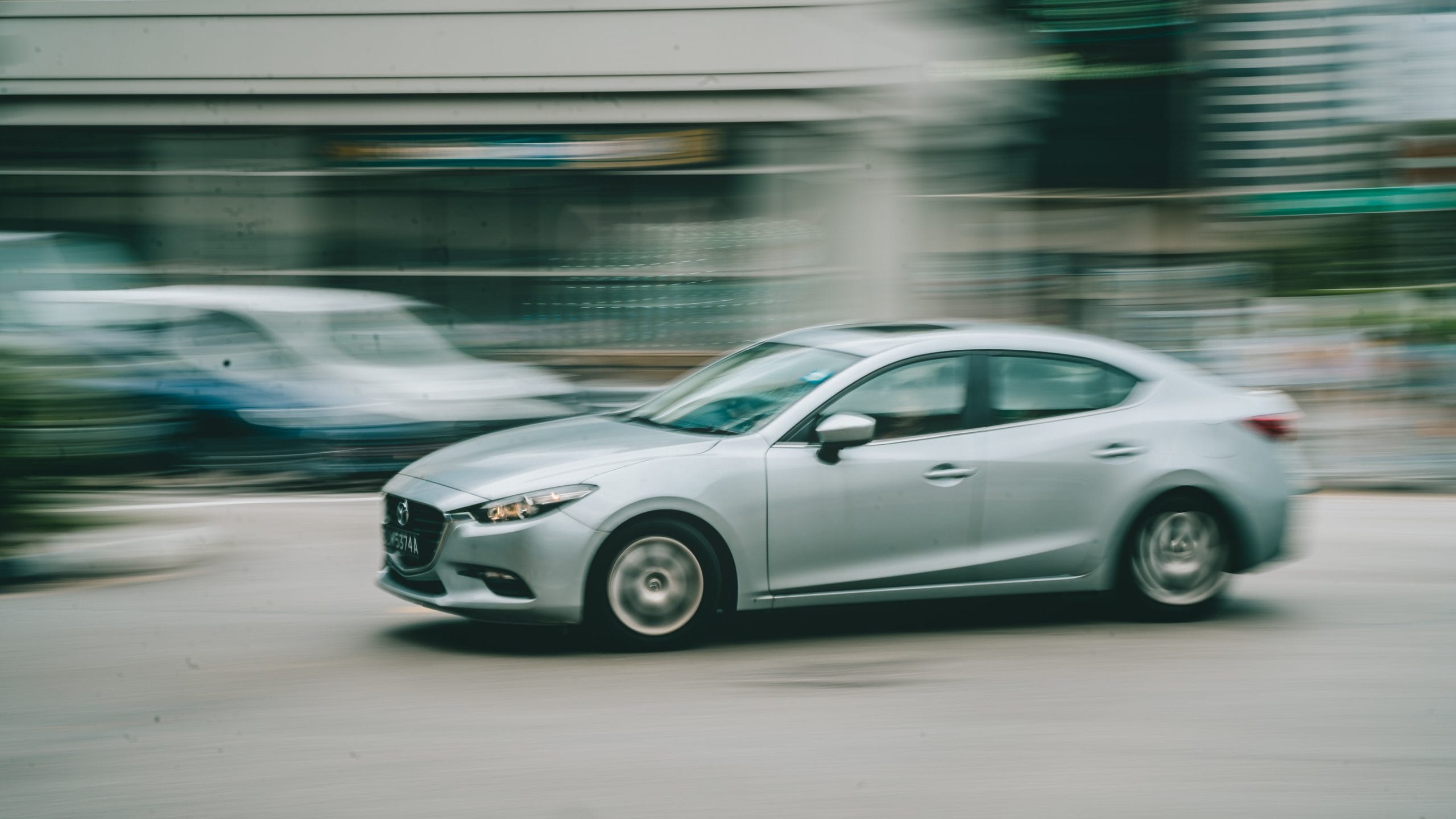car speeding down the street