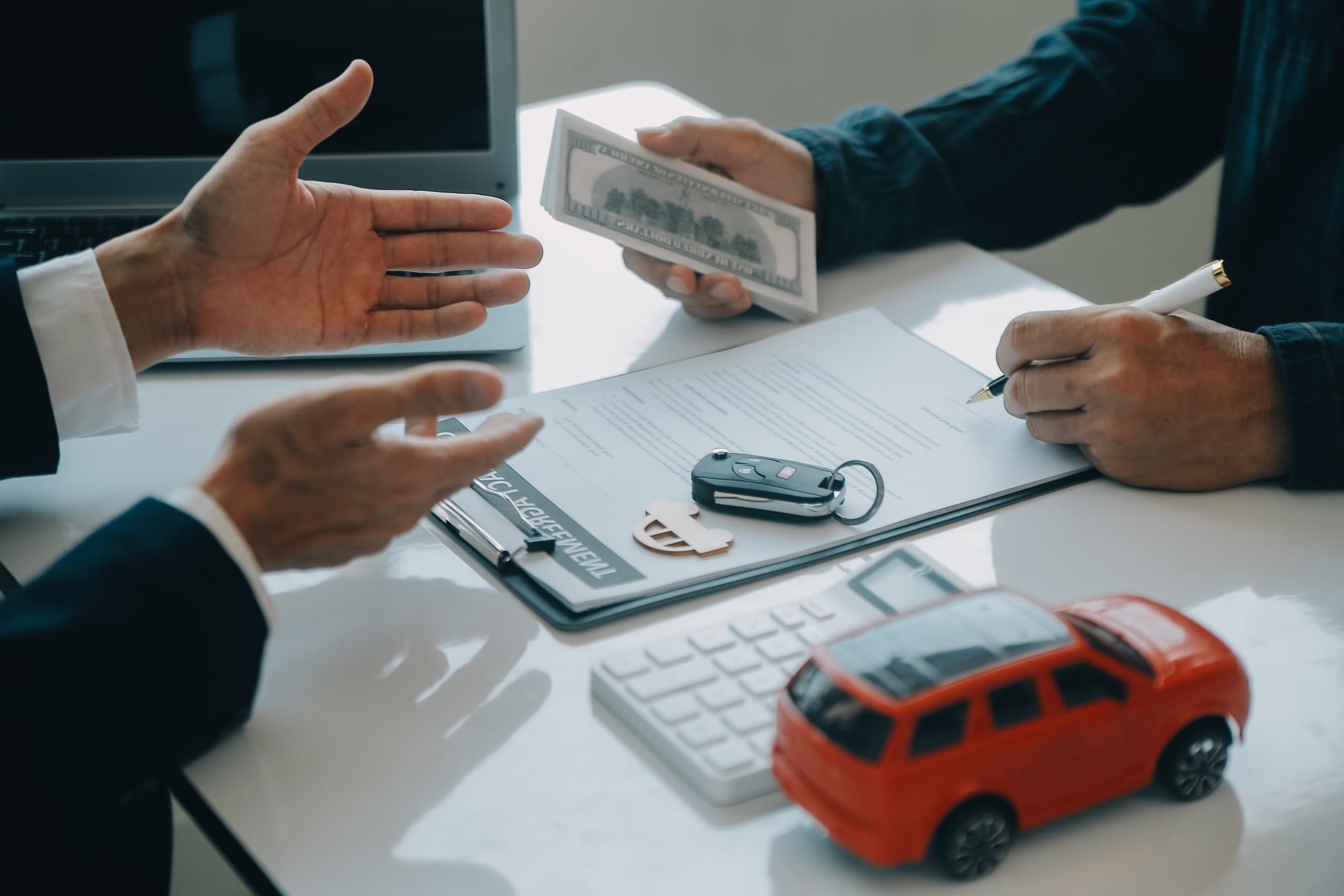 Someone signing up for an auto loan