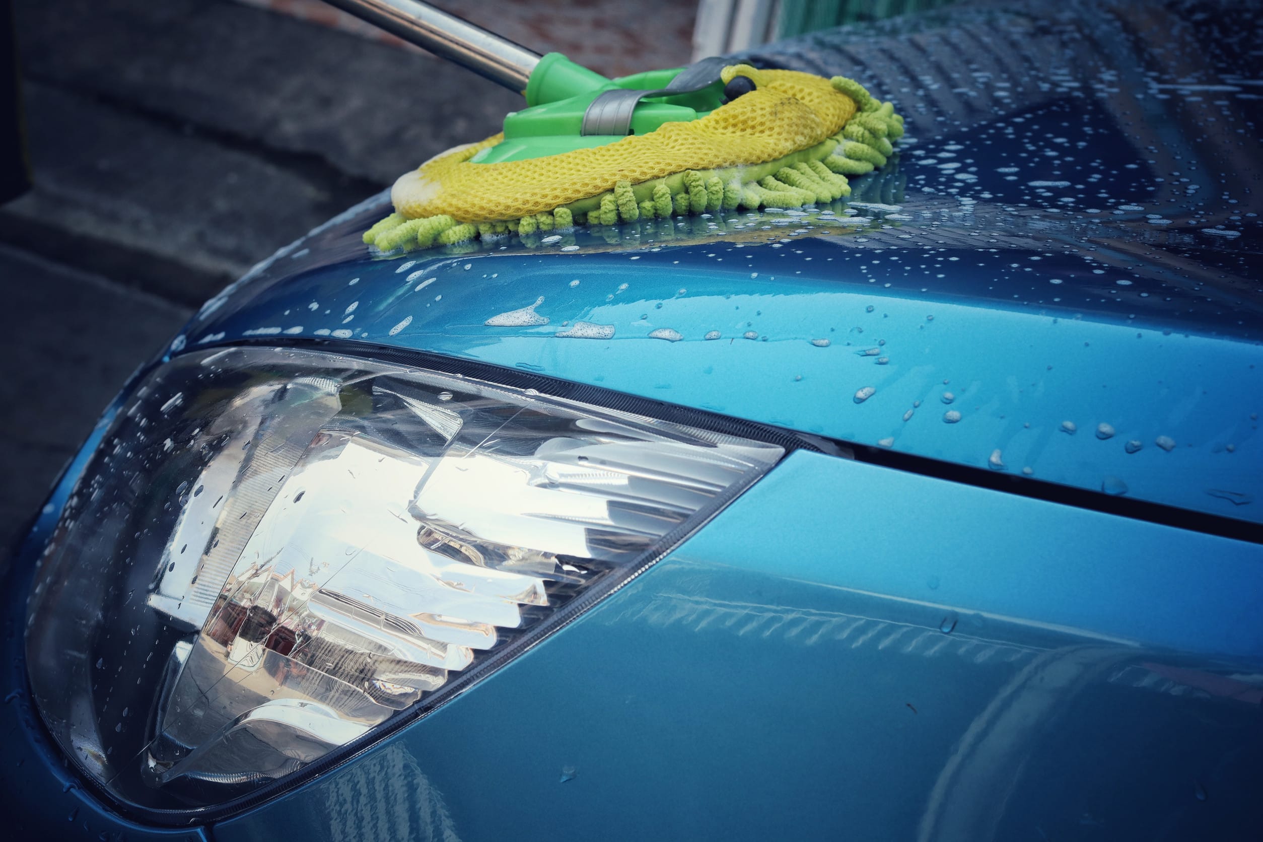 Close up of car washing and brush