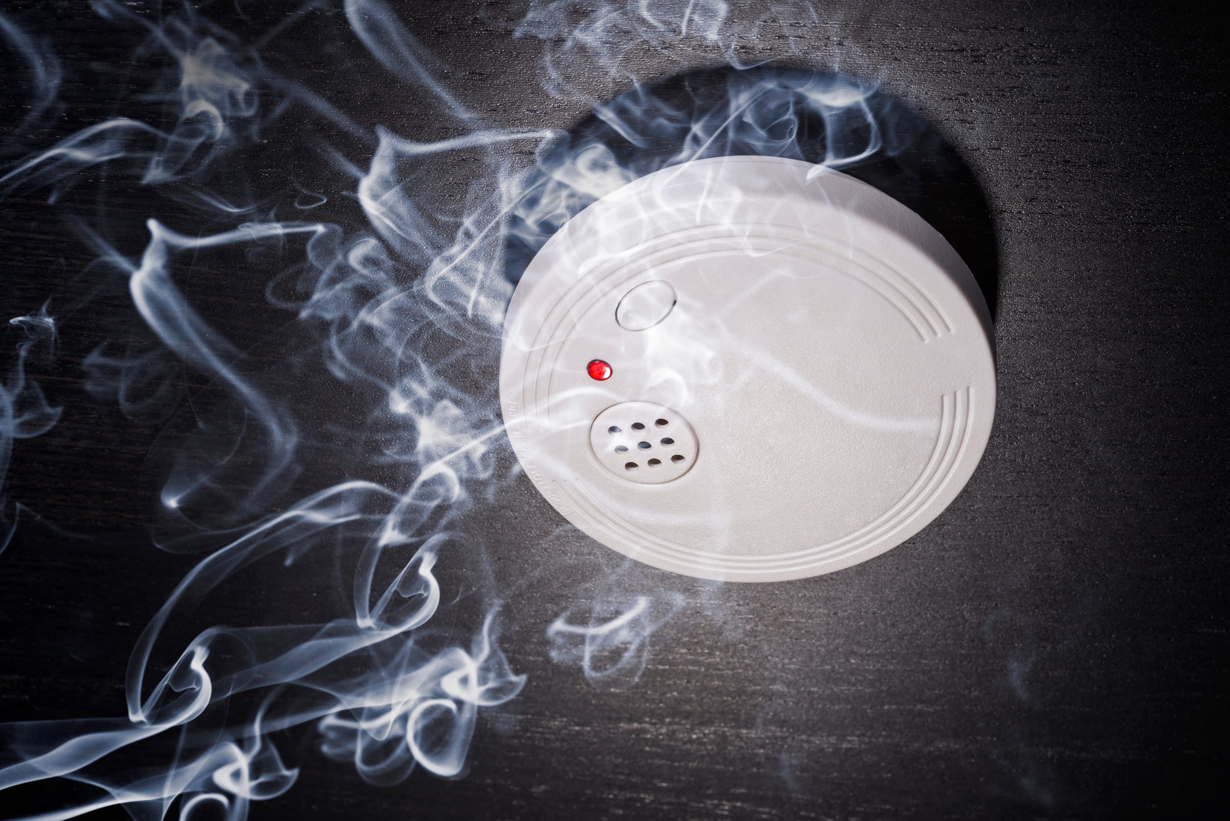 Smoke detector in the smoke of a fire