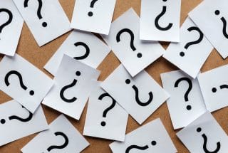 question marks on paper