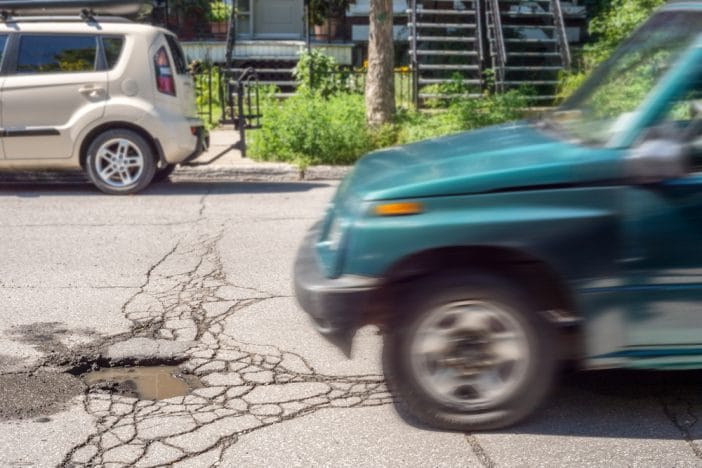 The "Pothole" Scams Cities Use to Avoid Paying for Your Car Damage